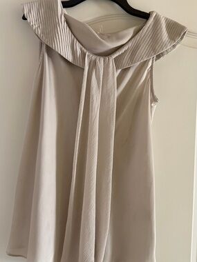 Sleeveless Pleated Collar Draped Front Blouse in Light cream